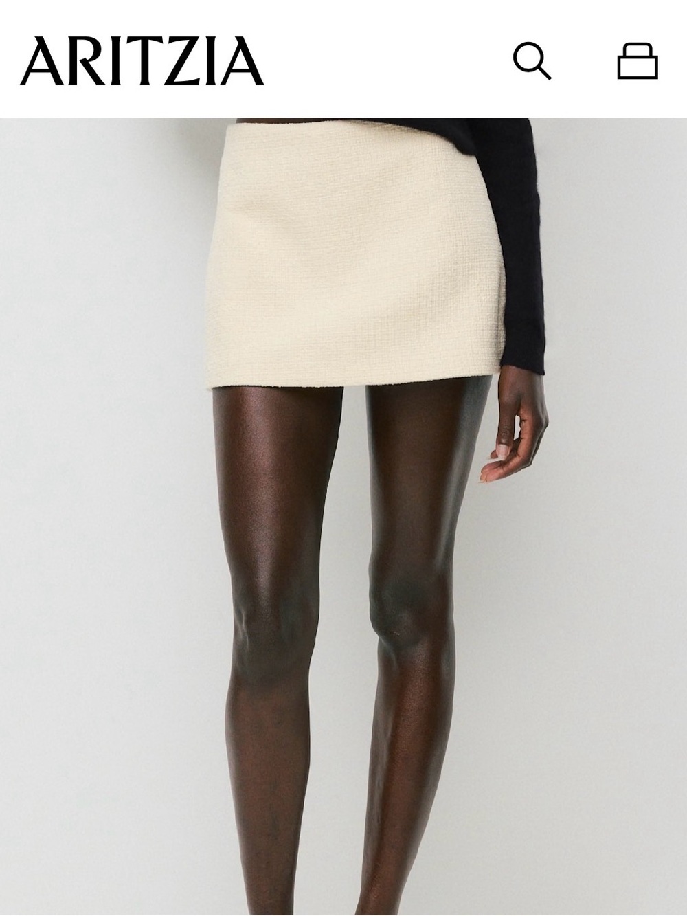 Babaton Expertise Skort seaside cream Aritzia